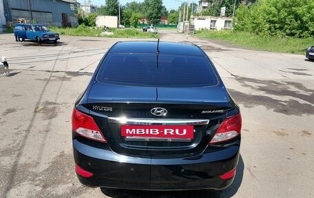 Hyundai Solaris II рестайлинг, 2011 год, 800 000 рублей, 13 фотография