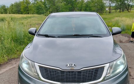 KIA Rio III рестайлинг, 2013 год, 850 000 рублей, 9 фотография