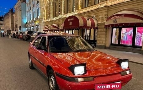 Mazda 323, 1991 год, 160 000 рублей, 3 фотография