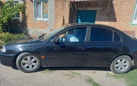 Toyota Avensis III рестайлинг, 2001 год, 400 000 рублей, 8 фотография