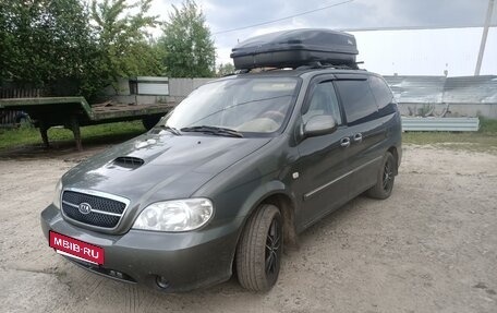 KIA Carnival III, 2005 год, 650 000 рублей, 13 фотография