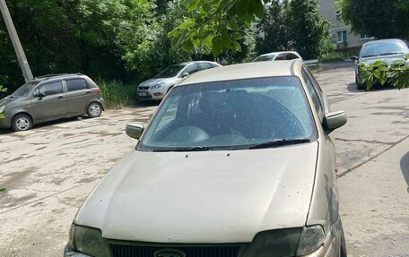 Ford Laser IV, 2001 год, 200 000 рублей, 3 фотография