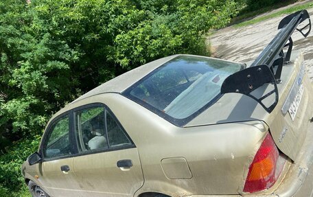Ford Laser IV, 2001 год, 200 000 рублей, 2 фотография