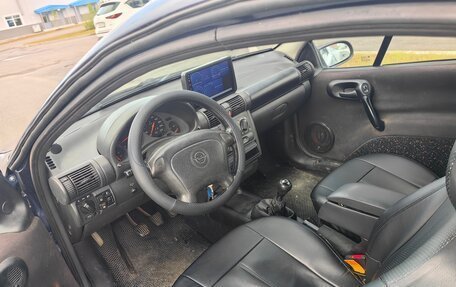 Opel Tigra, 1996 год, 500 000 рублей, 5 фотография