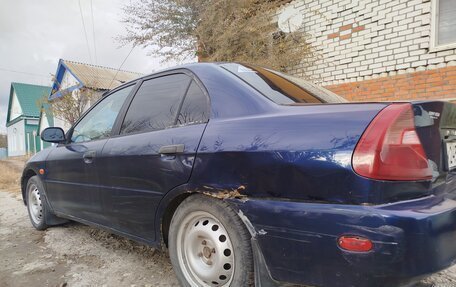Mitsubishi Mirage VI рестайлинг, 2000 год, 230 000 рублей, 4 фотография
