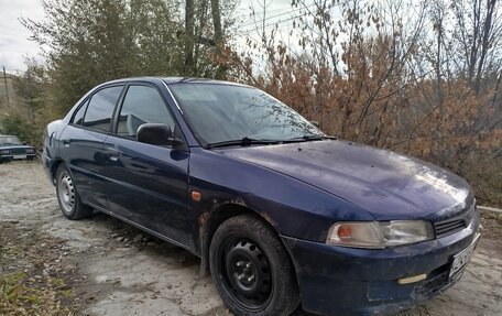 Mitsubishi Mirage VI рестайлинг, 2000 год, 230 000 рублей, 8 фотография
