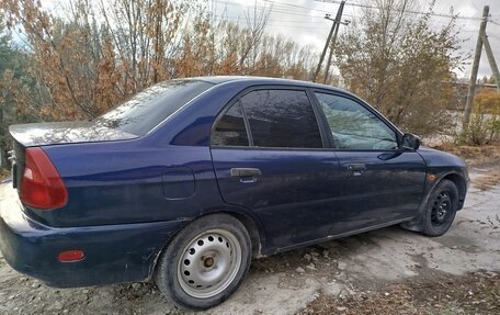 Mitsubishi Mirage VI рестайлинг, 2000 год, 230 000 рублей, 7 фотография