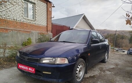 Mitsubishi Mirage VI рестайлинг, 2000 год, 230 000 рублей, 9 фотография