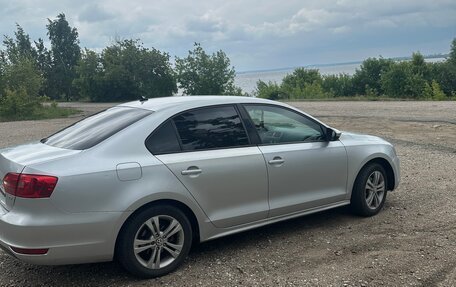 Volkswagen Jetta VI, 2011 год, 950 000 рублей, 4 фотография