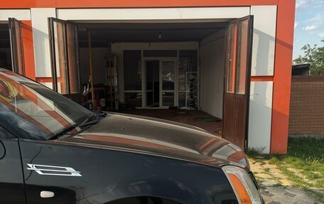 Cadillac SRX II рестайлинг, 2007 год, 430 000 рублей, 3 фотография