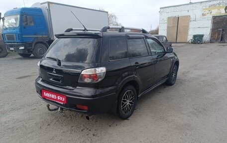 Mitsubishi Outlander III рестайлинг 3, 2005 год, 700 000 рублей, 5 фотография