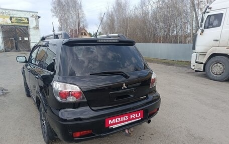 Mitsubishi Outlander III рестайлинг 3, 2005 год, 700 000 рублей, 4 фотография