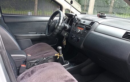 Nissan Tiida, 2012 год, 870 000 рублей, 19 фотография