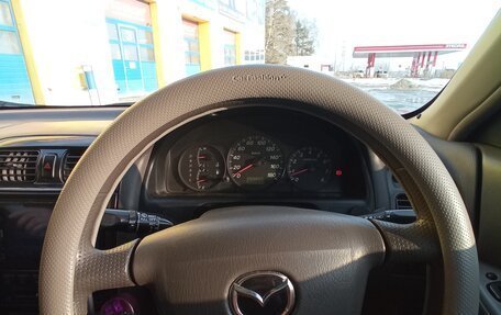 Mazda Capella, 2001 год, 350 000 рублей, 32 фотография