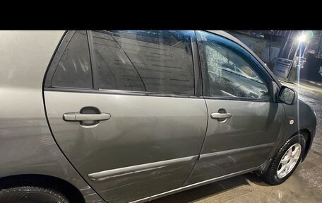 Toyota Corolla, 2004 год, 670 000 рублей, 7 фотография