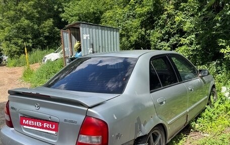 Mazda Protege, 2001 год, 100 000 рублей, 3 фотография