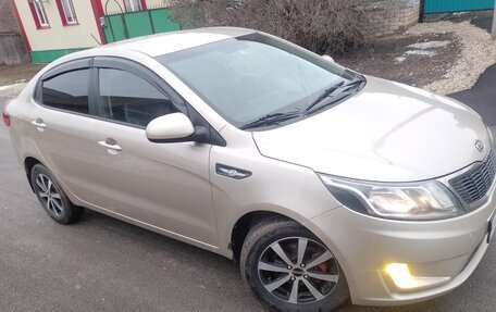 KIA Rio III рестайлинг, 2012 год, 710 000 рублей, 2 фотография