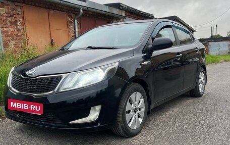 KIA Rio III рестайлинг, 2011 год, 700 000 рублей, 2 фотография
