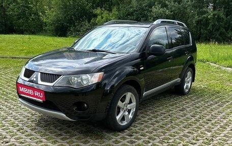 Mitsubishi Outlander III рестайлинг 3, 2007 год, 945 000 рублей, 2 фотография