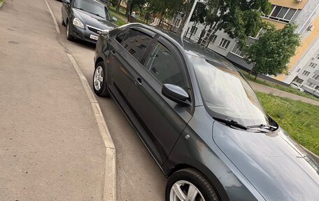 Skoda Rapid I, 2014 год, 670 000 рублей, 3 фотография