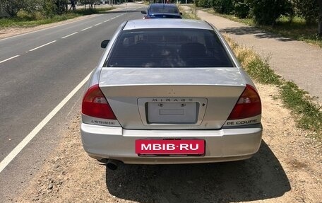 Mitsubishi Mirage VI рестайлинг, 2002 год, 195 000 рублей, 3 фотография