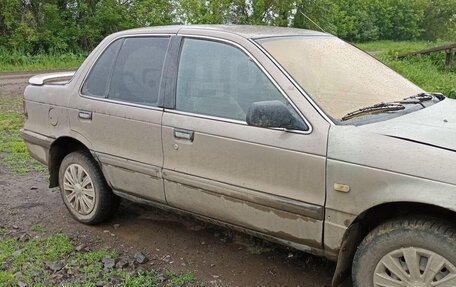 Mitsubishi Lancer VII, 1989 год, 140 000 рублей, 2 фотография