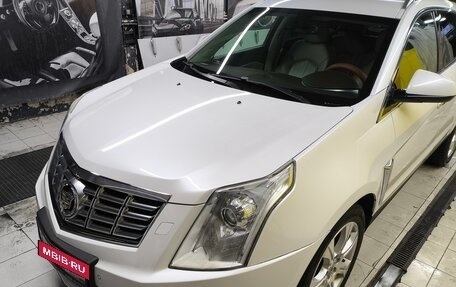 Cadillac SRX II рестайлинг, 2014 год, 1 700 000 рублей, 14 фотография
