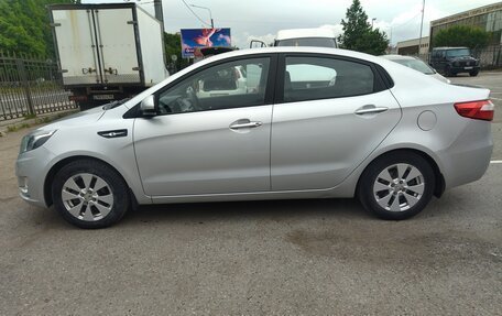 KIA Rio III рестайлинг, 2013 год, 900 000 рублей, 3 фотография