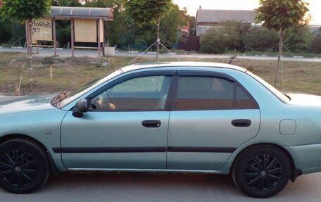 Mitsubishi Carisma I, 2003 год, 319 000 рублей, 1 фотография