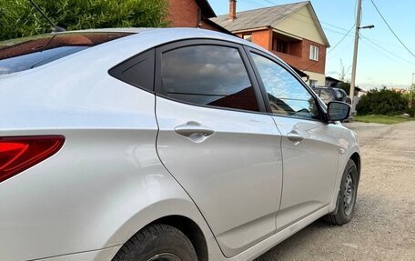 Hyundai Solaris II рестайлинг, 2011 год, 680 000 рублей, 10 фотография