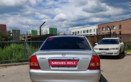 Mazda Familia, 2003 год, 600 000 рублей, 7 фотография