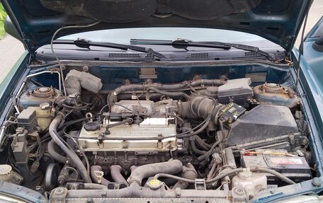 Mitsubishi Carisma I, 1997 год, 81 000 рублей, 13 фотография