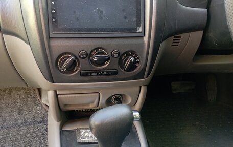 Mazda Familia, 2001 год, 300 000 рублей, 9 фотография