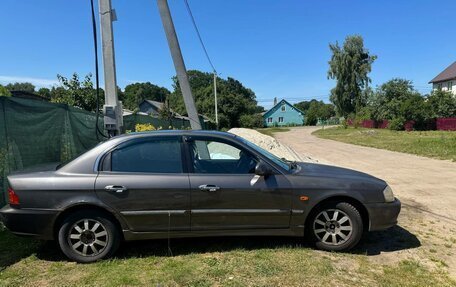 KIA Magentis I, 2001 год, 340 000 рублей, 10 фотография