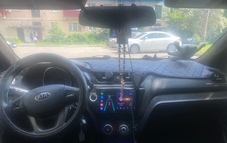 KIA Rio III рестайлинг, 2013 год, 750 000 рублей, 14 фотография