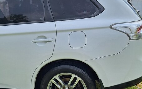 Mitsubishi Outlander III рестайлинг 3, 2013 год, 1 350 000 рублей, 16 фотография