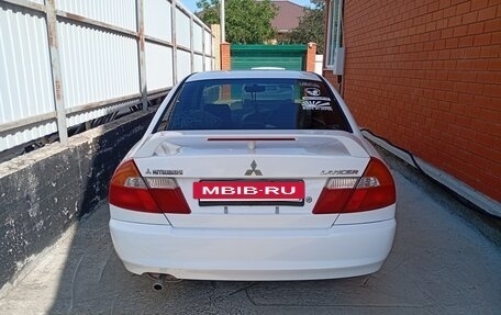 Mitsubishi Lancer VII, 1999 год, 400 000 рублей, 14 фотография