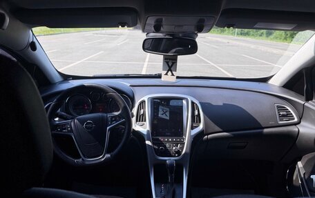 Opel Astra J, 2013 год, 16 фотография