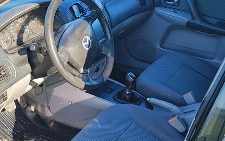 Mazda 323, 2002 год, 240 000 рублей, 14 фотография