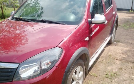 Renault Sandero I, 2013 год, 650 000 рублей, 2 фотография