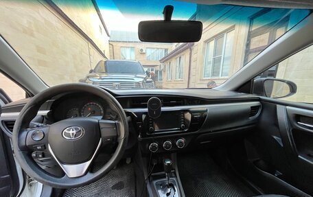 Toyota Corolla, 2013 год, 950 000 рублей, 7 фотография