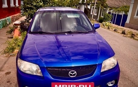 Mazda Protege, 2002 год, 305 005 рублей, 3 фотография