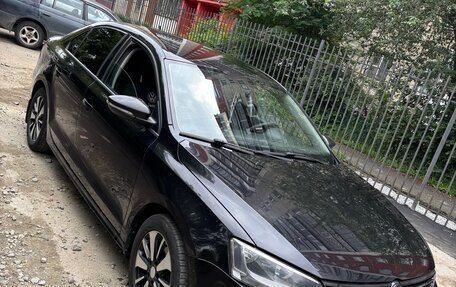 Volkswagen Jetta VI, 2011 год, 899 999 рублей, 3 фотография
