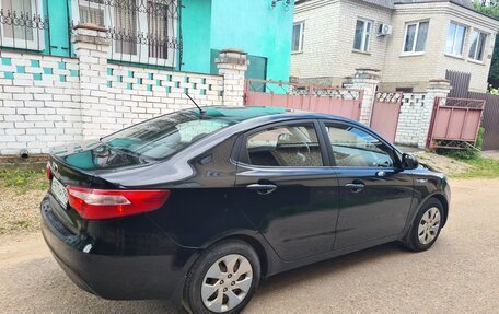 KIA Rio III рестайлинг, 2013 год, 915 000 рублей, 29 фотография