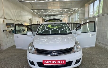 Nissan Tiida, 2010 год, 900 000 рублей, 13 фотография