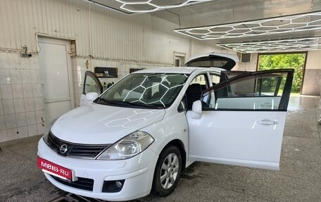 Nissan Tiida, 2010 год, 900 000 рублей, 12 фотография