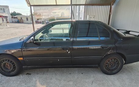 Nissan Primera II рестайлинг, 1991 год, 300 000 рублей, 13 фотография