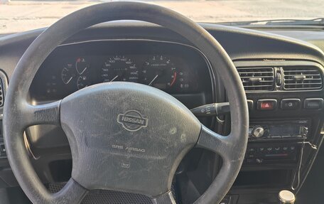Nissan Primera II рестайлинг, 1991 год, 300 000 рублей, 34 фотография