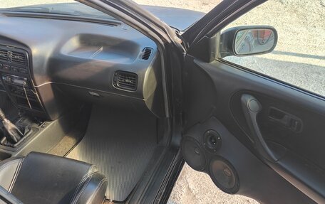 Nissan Primera II рестайлинг, 1991 год, 300 000 рублей, 39 фотография