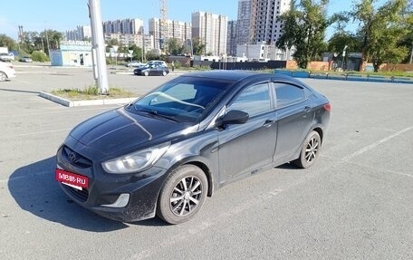 Hyundai Solaris II рестайлинг, 2011 год, 700 000 рублей, 4 фотография